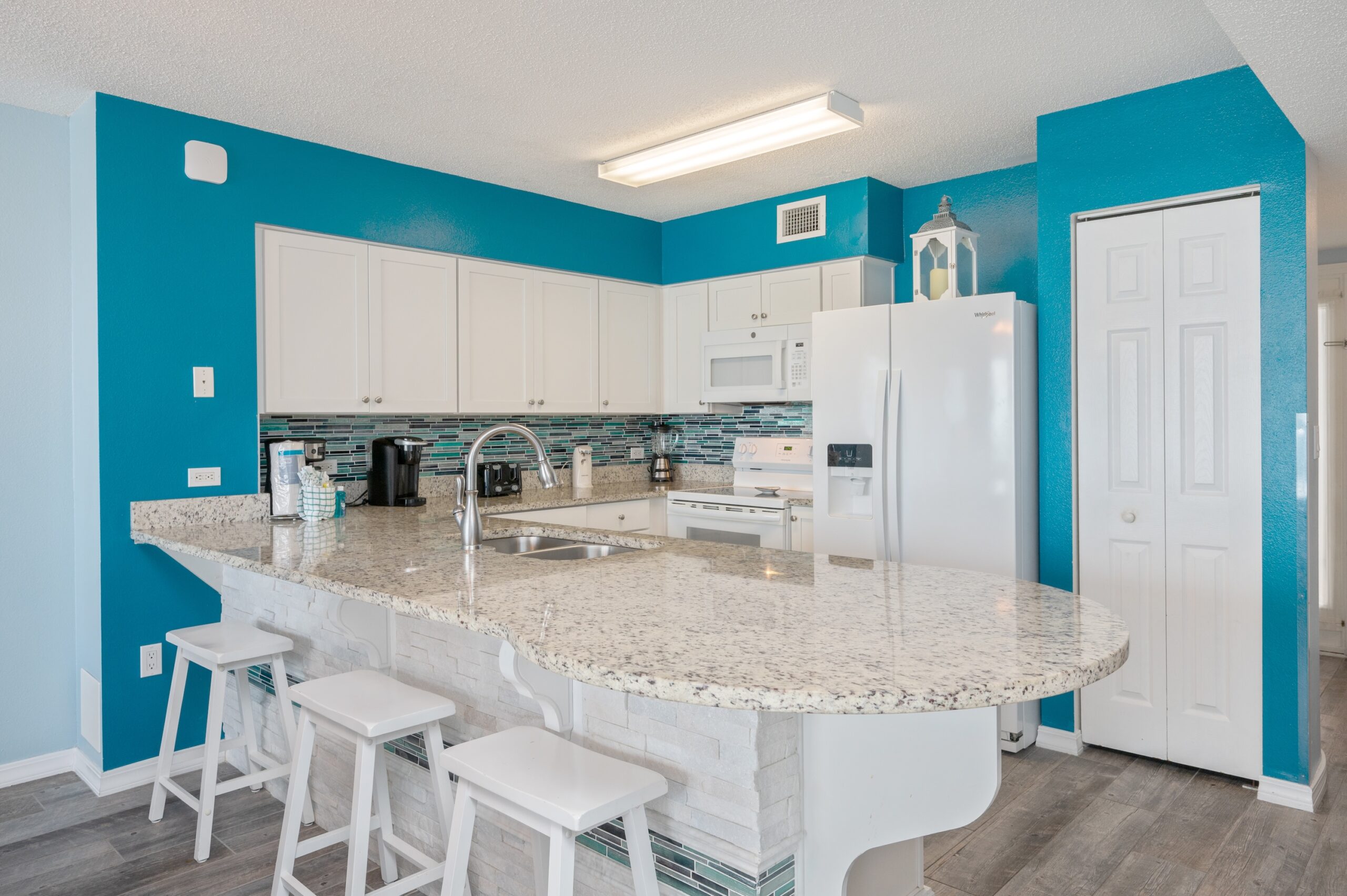 Wide view of the updated kitchen in our Okaloosa Beach Condo