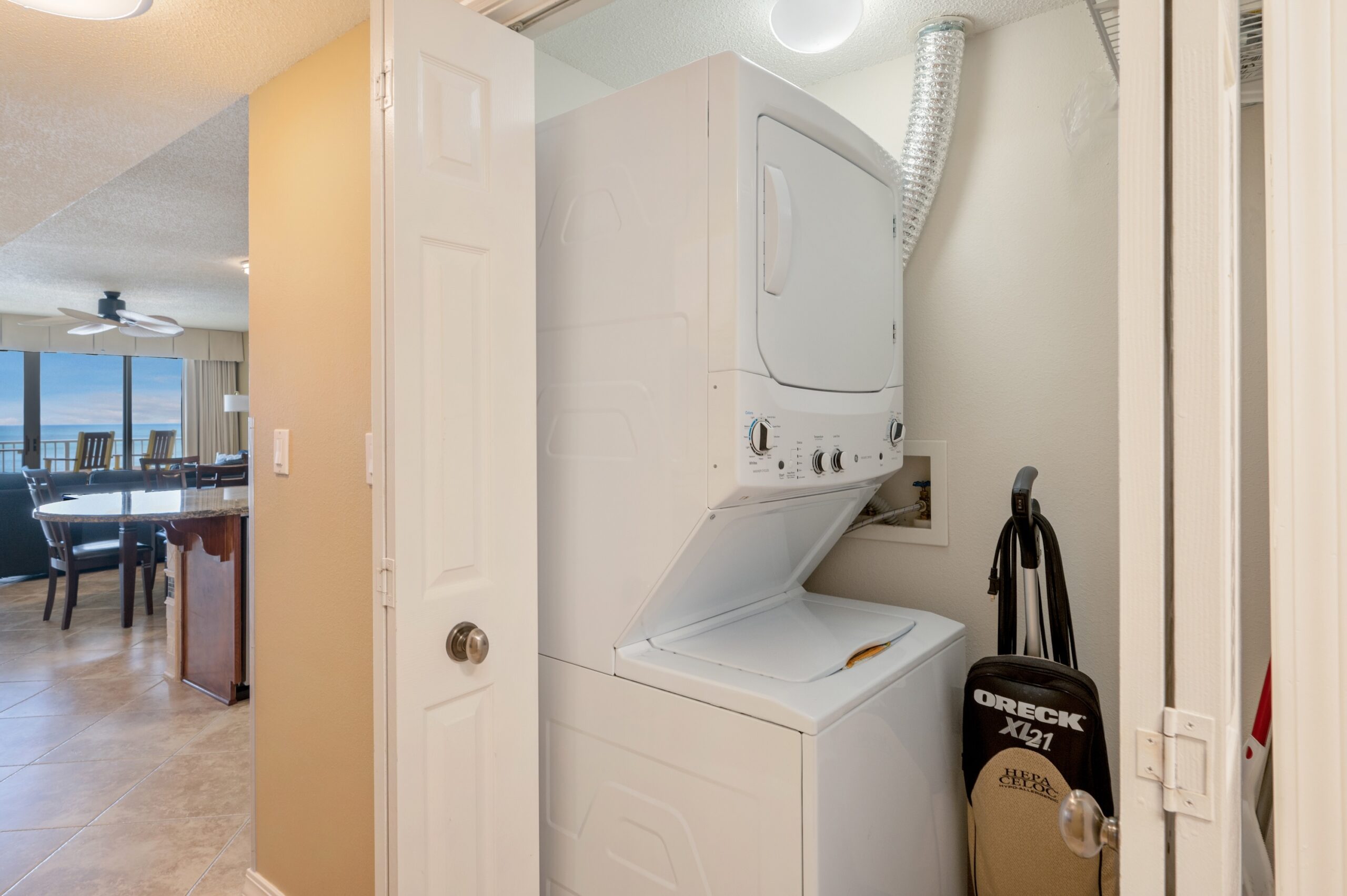 Washer-dryer in the hall closet of our three bedroom Island Princess 615 beach condo
