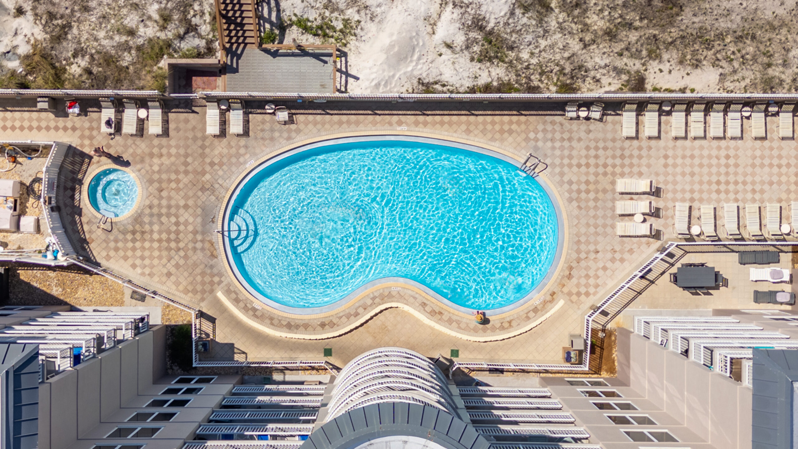 Aerial view of the pool and hot tub at Island Princess, Okaloosa Island